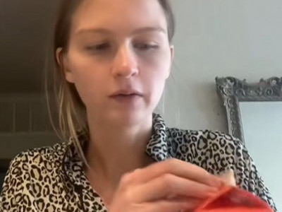 žena